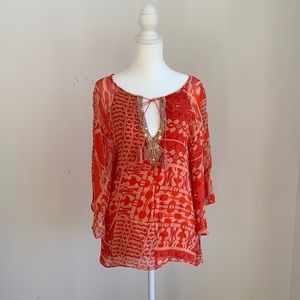Sanctuary Crepe Fully Lined with Beaded Neckline and Tie.